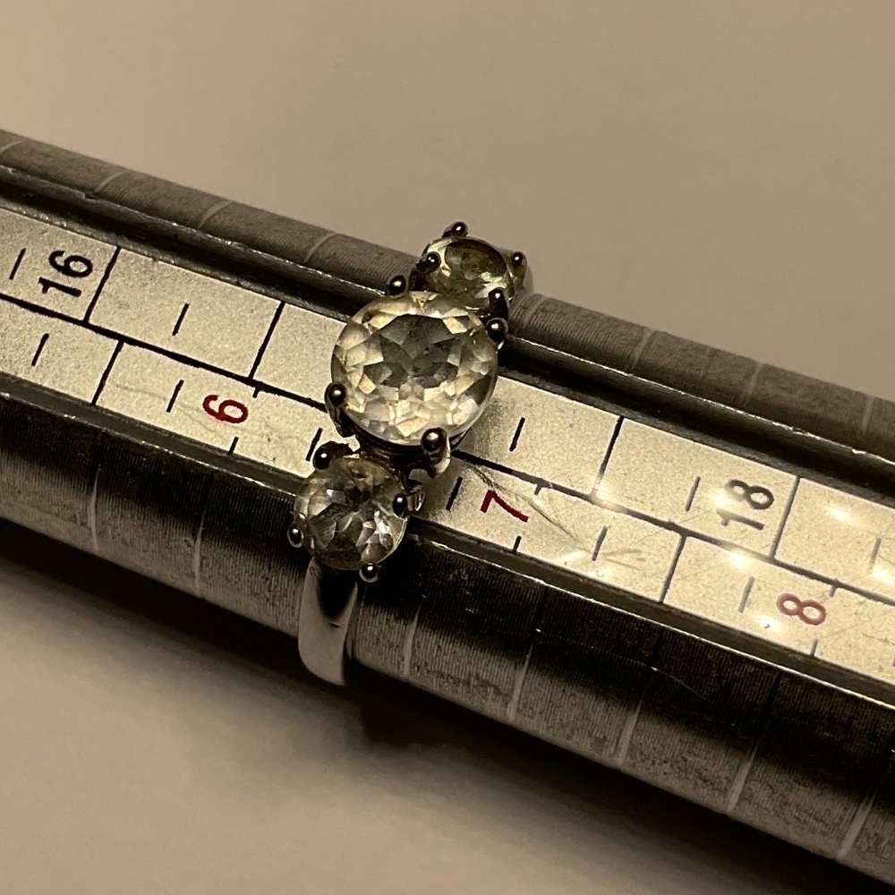 Sterling Silver Ring with 3 Faceted Clear Stones. Size 6.5
